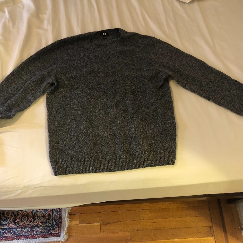 Lightly worn, grey, 100% wool sweater. Size Medium. Uniqlo